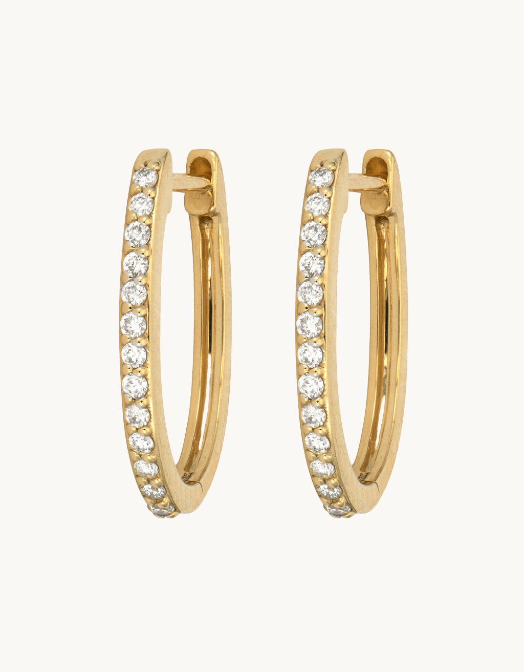 three stories Classic Oval Pave Hoops